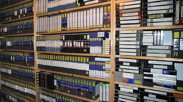 Shelves full of labelled video cassettes